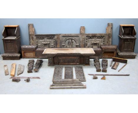 Oak fire surround with four carved figures, width of mantle shelf- 264cm