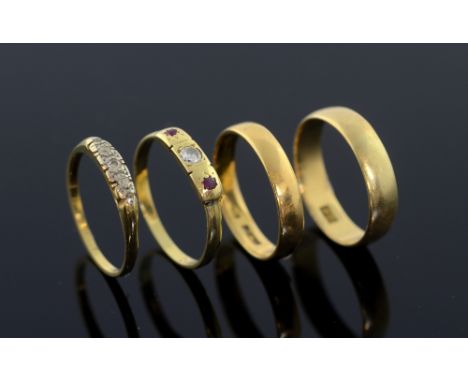 Two Edwardian rings, one set with small diamonds, another with ruby and diamond and two gold wedding bands all 18ct gold