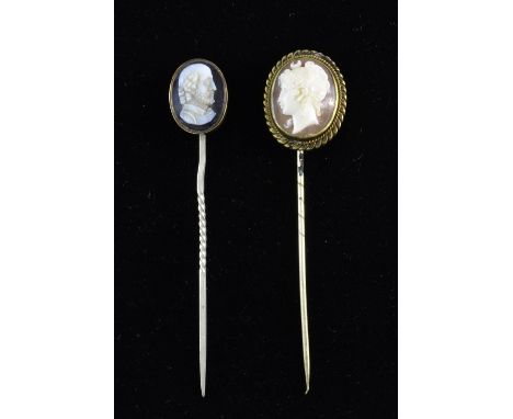 A  Victorian carved agate stick pin  depicting William Shakespeare and a lady shell cameo