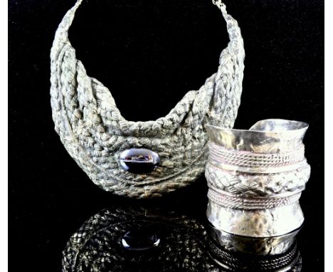 A vintage silver collar necklace with a matching large silver cuff bangle with a weave design to centre, 1970's
Provenance;  