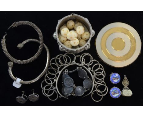 Costume jewellery to include two steel bracelets, enamel earrings , carved bone and other items