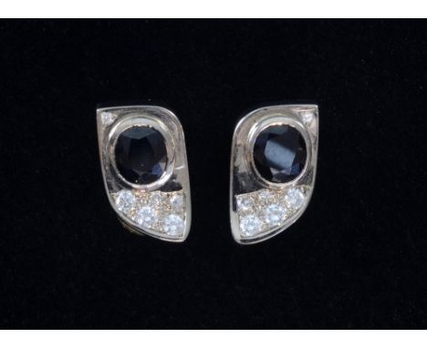 Sapphire and diamond clip earrings in 18ct gold.
Provenance;  From the collection of Liesl Muller-Johnson  1922-2014 
