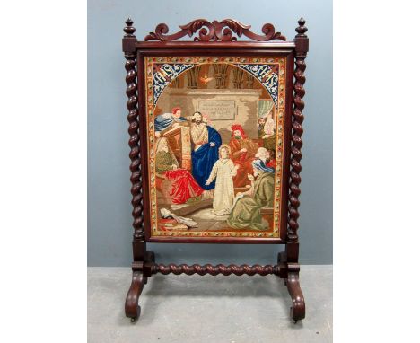Victorian mahogany framed firescreen with carved top rail and barley twist supports,  tapestry panel with religious scene, 14