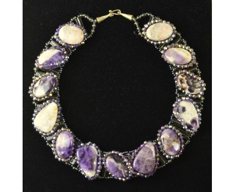 An Amethyst quartz collar, other hardstone and shell items