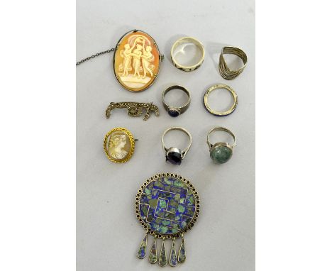 A collection of vintage costume jewellery to include a silver lizard set with green and white paste, two cameo brooches and m