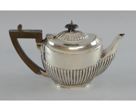 Edward VII silver teapot with half-gadrooned body on oval foot, by Sibray, Hall & Co., London, 1903, gross weight 8.4oz, 263g