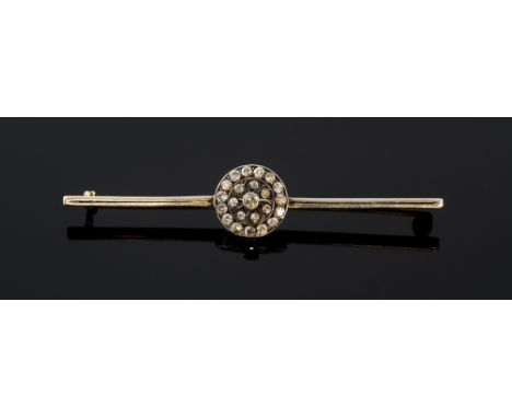 A diamond cluster bar brooch, centering a circular plaque set with single cut diamonds mounted in platinum and gold.  Circa 1