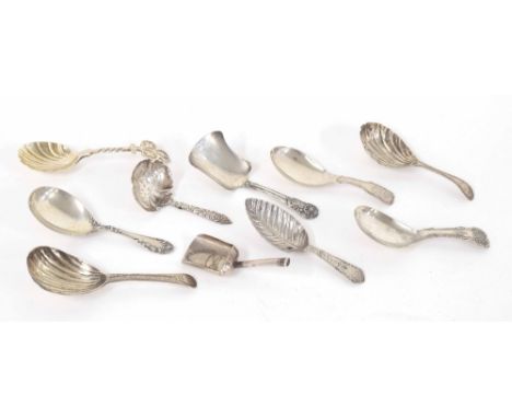 Collection of Georgian and later silver caddy spoons, some with scalloped bowls, 2.7oz t; also a plated example (10)