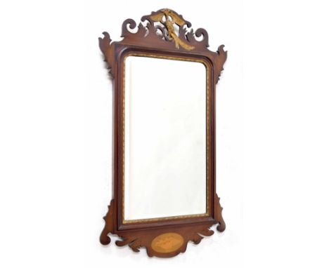 Georgian style&nbsp; fretwork wall mirror, the bevelled glass within mahogany frame surmounted by parcel gilt phoenix finial,
