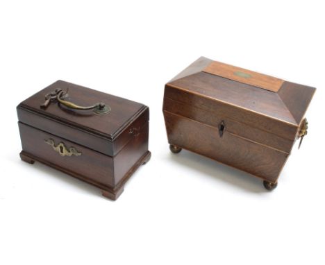 19th century rosewood tea caddy of sarcophagus form, with divided interior, raised on brass ball feet, 7" wide, 4.5" deep, 5"
