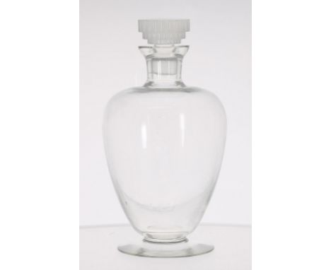 René Lalique glass decanter and stopper, of inverted baluster form upon a wide circular base, the stopper with stepped lobed,