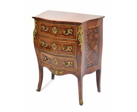 French kingwood, rosewood marquetry bombé serpentine commode chest, with applied ornate gilt metal mounts consisting of three