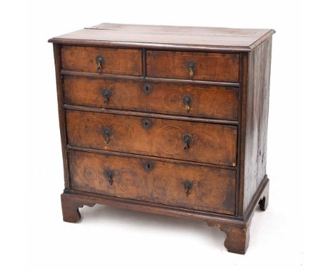 Early 18th century walnut inlaid chest of drawers, the quarter veneered moulded top over two short and three long graduated d