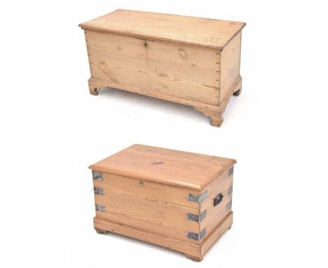 Pine blanket chest, 41.5" wide, 18.5" deep, 22" high, raised on shaped bracket feet; together with a metal mounted pine chest
