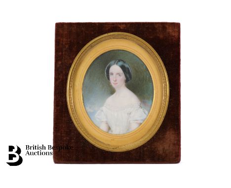 Early 19th century portrait miniature of a young woman, approx 80mm x 92mm, gilt and velvet frame.&nbsp;

-