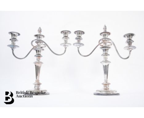 A pair of good quality 20th century silver plated candlesticks, each candlestick having two-branches with gadrooned decoratio