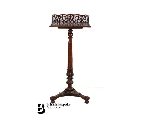 Mahogany butlers cutlery stand, with a galleried front and two carry handles on a turned column terminating on a tripod base,