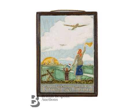 A WWII Delft tile 'Voedsel-Vrede-Vrijheid 29 April 1945 SMEI', with Delft factory mark to its back, approx 14.5 by 20cms.&nbs