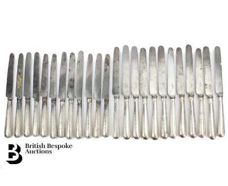 Twelve silver handled knives, with Garrard blades together with another set of twelve silver handled knives with Garrard blad