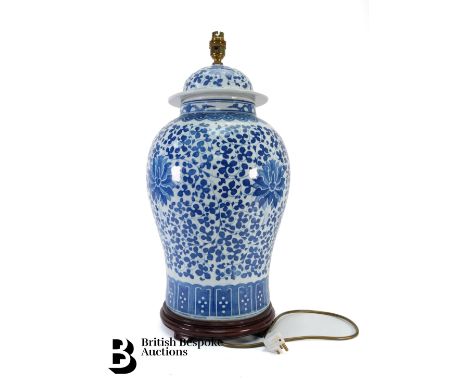 Large Chinese blue and white lamp base, baluster form with foliate decoration, converted for electricity, single bulb fitting