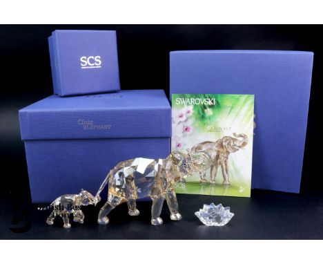 Swarovski Crystal Society SCS 2013 Cinta Elephant 1137207 with lotus plaque, designed by Elisabeth Adamer. Together with a ba
