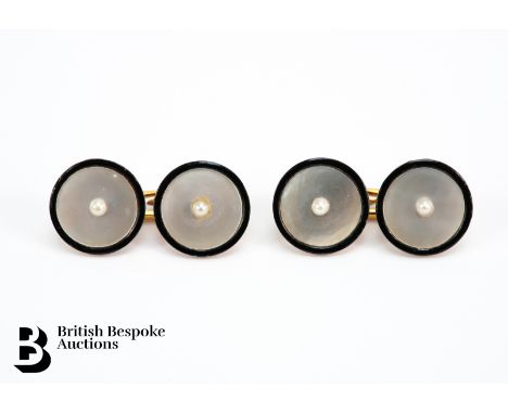 A pair of 9ct gold cufflinks, set with mother of pearl and a single pearl, approx 7.1 gms, mm Crop &amp; Farr.&nbsp;
Provenan