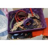 Two boxes of assorted belts etc