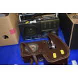 A Roberts RP20 VHF/MW/LW pre-set radio together with a vintage Brownie movie camera in leather case