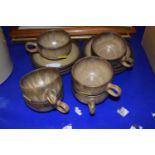 A quantity of Denby wares, cups and saucers