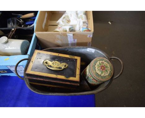 A tin box containing money box, various tins, painted cockerel doorbell and various assorted coinage