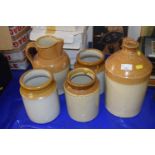 Quantity of assorted Irvin ware ceramic jars to include a rum jar by Creake & Colby of Burnham