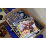 Box of assorted CD's and various Playstation 3 games etc
