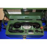 Military field telephone 704B in green case with carrying strap and clear dial