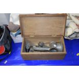 A boxed vintage food chopper and meat grinder