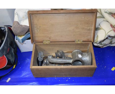 A boxed vintage food chopper and meat grinder