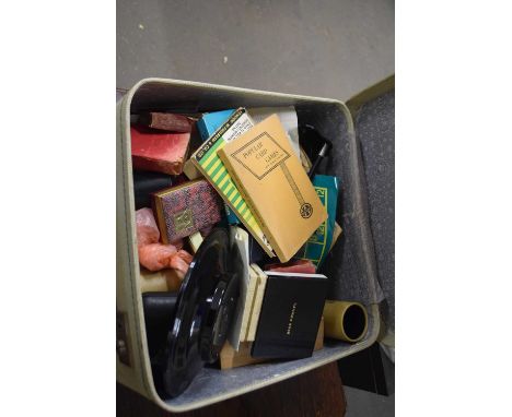 A vintage suitcase and assorted contents