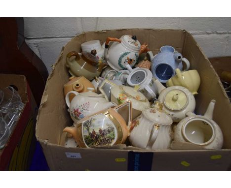 Large box of assorted teapots to include ceramic and porcelain examples