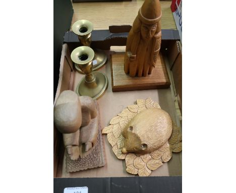 Selection of various carved wood figures and a pair of early 19th C brass oval based candlesticks 
