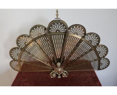Brass peacock firescreen 