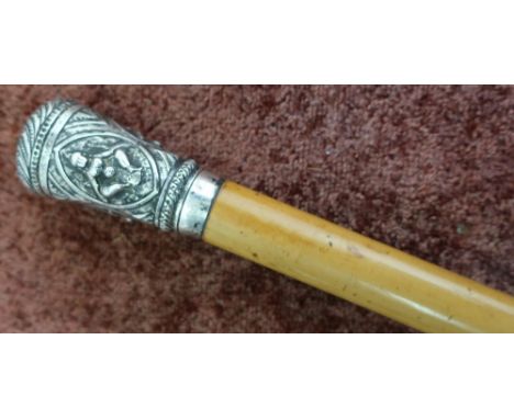 Victorian Malacca walking cane with Indian white metal top embossed with various figures (overall length 87cm) 