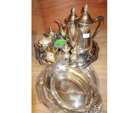 Large silver plated tray with four piece silver plated tea set, various silver plated cruet sets, small brass type carriage c