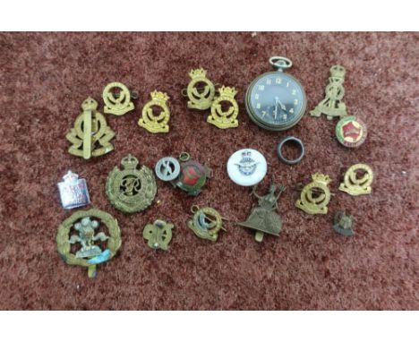 Royal Air Force sweetheart brooch, a South Lancashire Prince of Wales Own cap badge, a selection of other cap badges includin