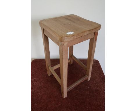 Light wood four legged stool 