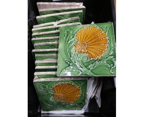 Fifteen assorted 19th/20th C green glaze floral pattern ceramic wall tiles 