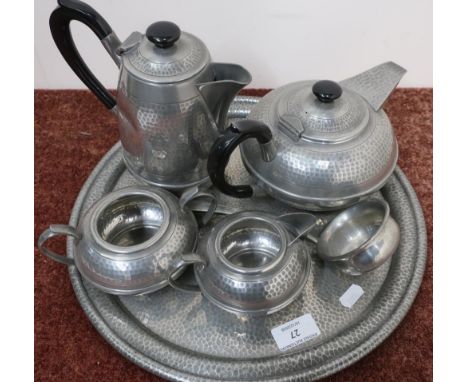 Five piece Sheffield pewter tea service with hammered detail on circular tray, with a pewter ladle 