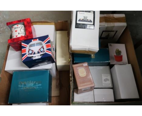 Ex shop stock novelty mugs, Leonardo dog studies, an artistic bronzed bulldog, tea light holders etc in two boxes 
