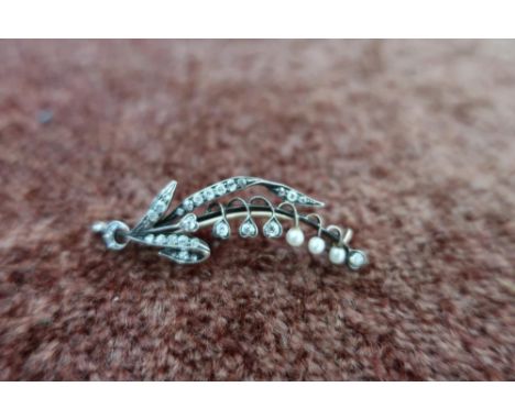 Yellow metal diamond and seed pearl spray brooch 