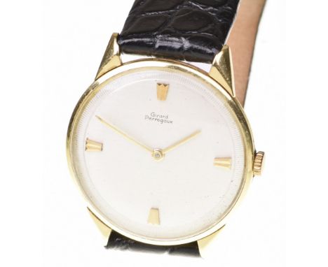 Girard Perregaux: A Gentleman's 18ct gold manual wind wristwatchThe circular signed silver tone dial, with gold tone double b