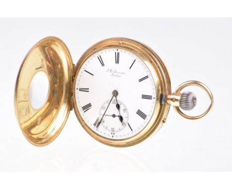 An 18ct gold half hunter keyless wind pocket watchThe white enamel dial with black Roman numerals, manual wind, glass deficie