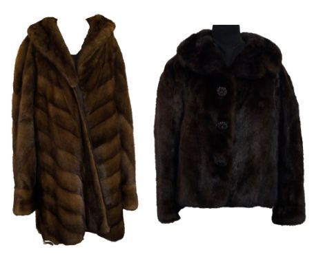 A Vintage ladies mink and leather reversible full length coatThe brown fur with chocolate brown leather interior, full length